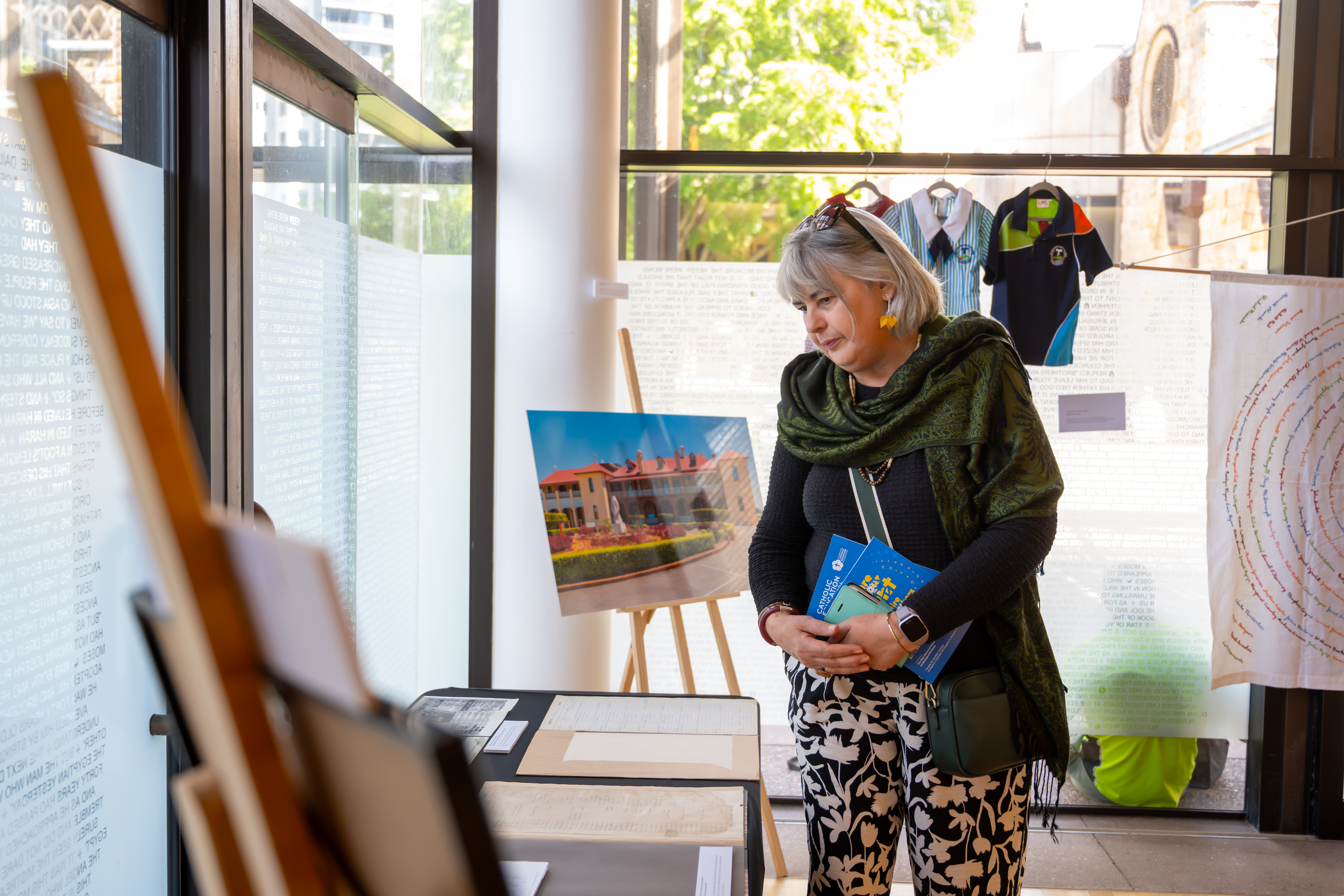 Guest views BCE's School of Origin Exhibition