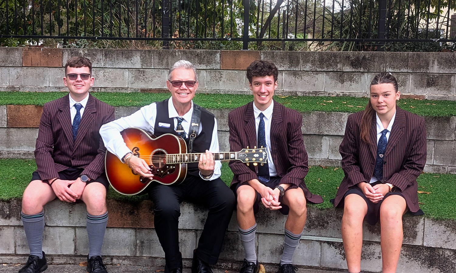 Senior Mathematics teacher, Emmaus College, Jimboomba Clarence Hart III with students