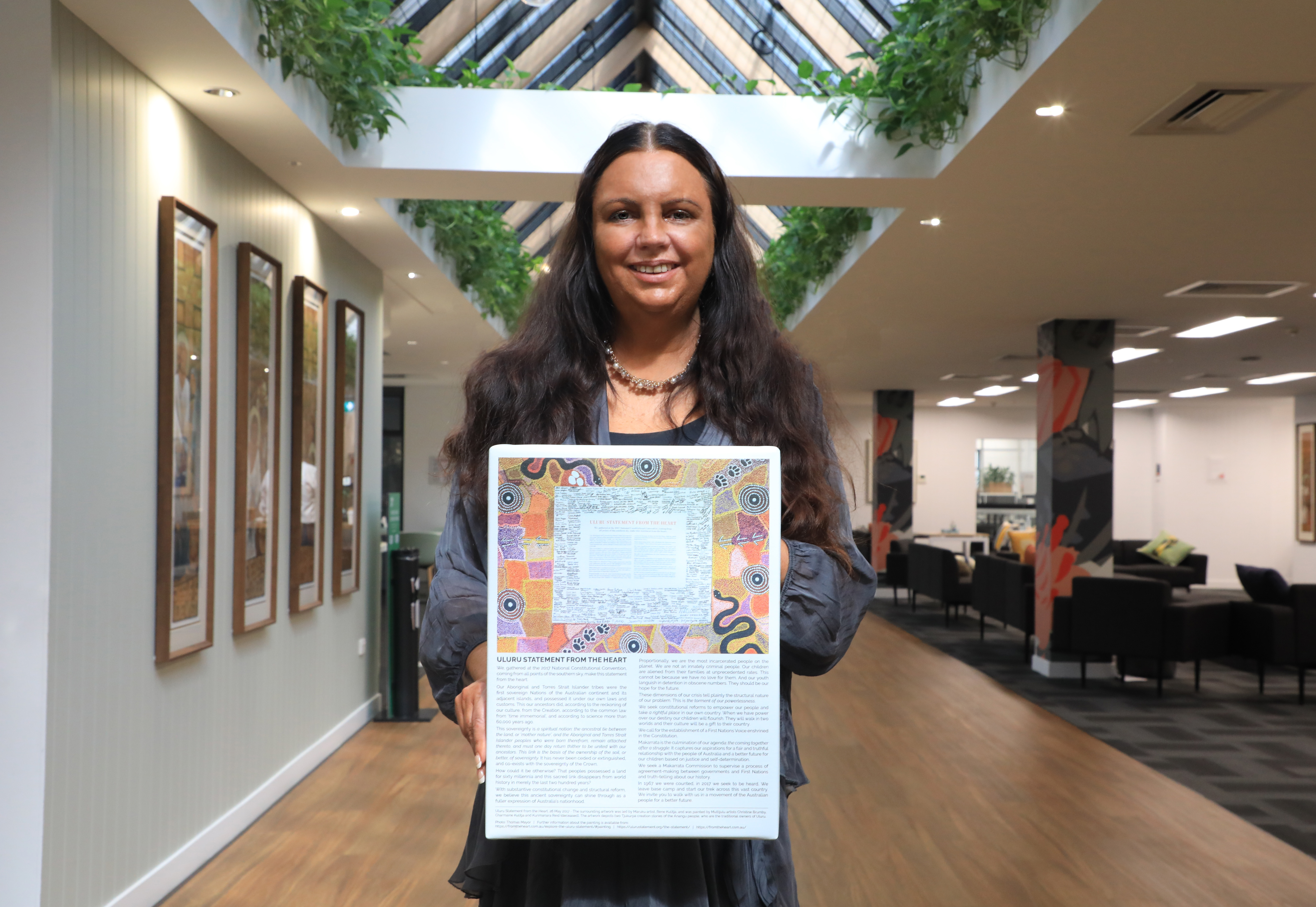 Dr Mayrah Dreise with Uluru Statement from the Heart.jpg