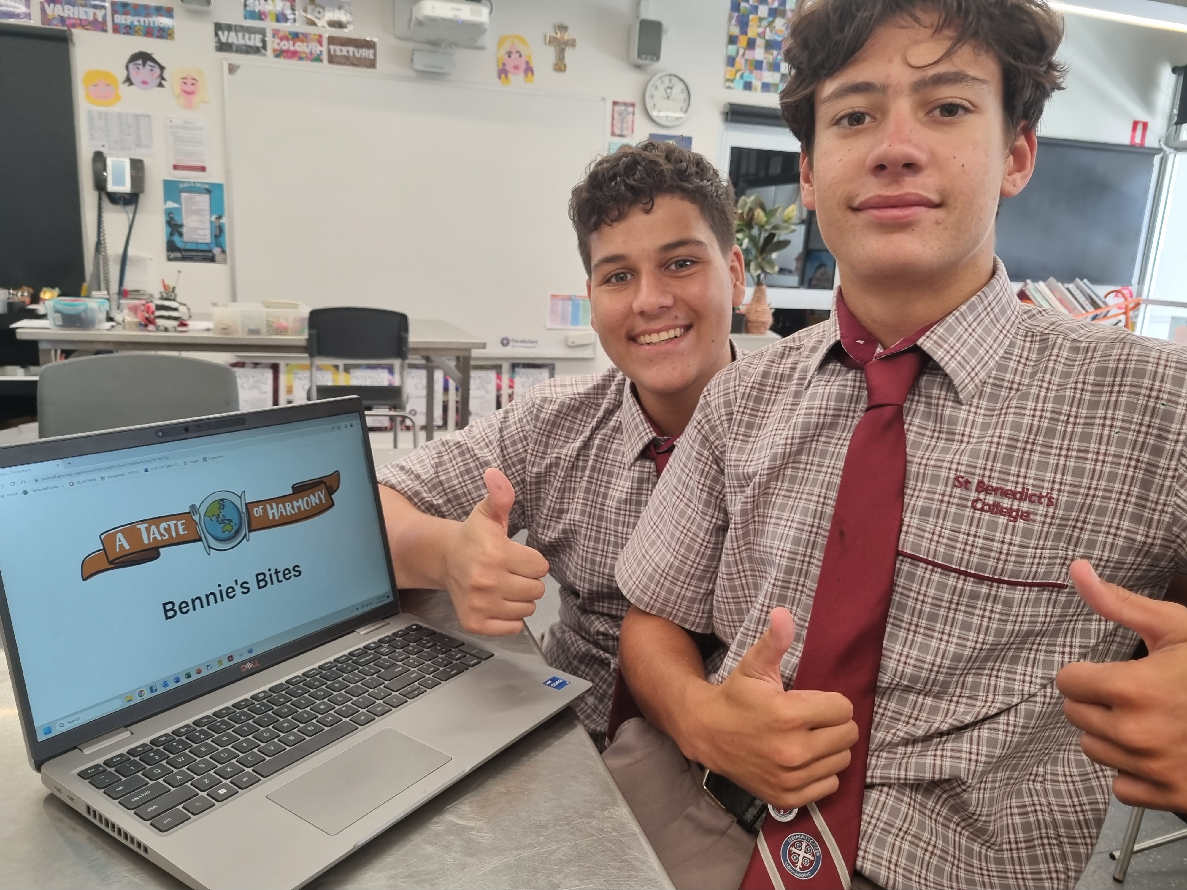 Students work on publishing a recipe called Bennie’s Bites – one from the school’s cookbook, A Taste of Harmony.jpg