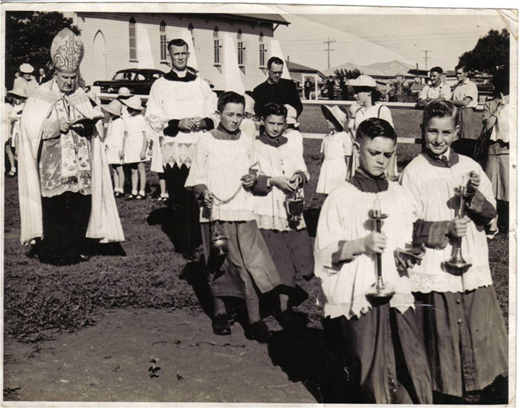 Anthony (Tony) Wrafter in the 2nd row, far side, holding the holy water..png