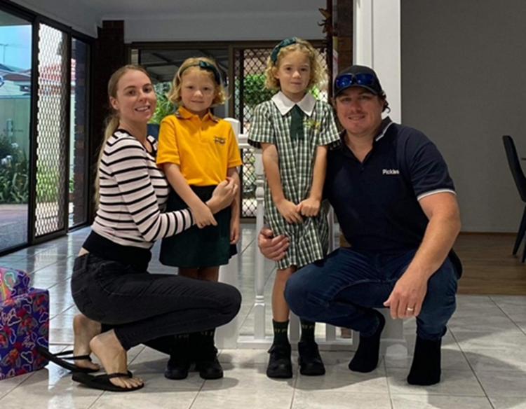 Jason Wrafter (Son of David Wrafter, Grandson of Tony Wrafter) with his wife and two daughters, who are both currently enrolled at St Pius Primary School..png